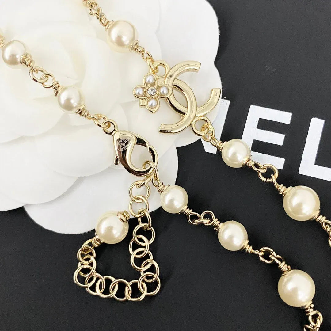 Classic Pearl Necklace with Metal Accents