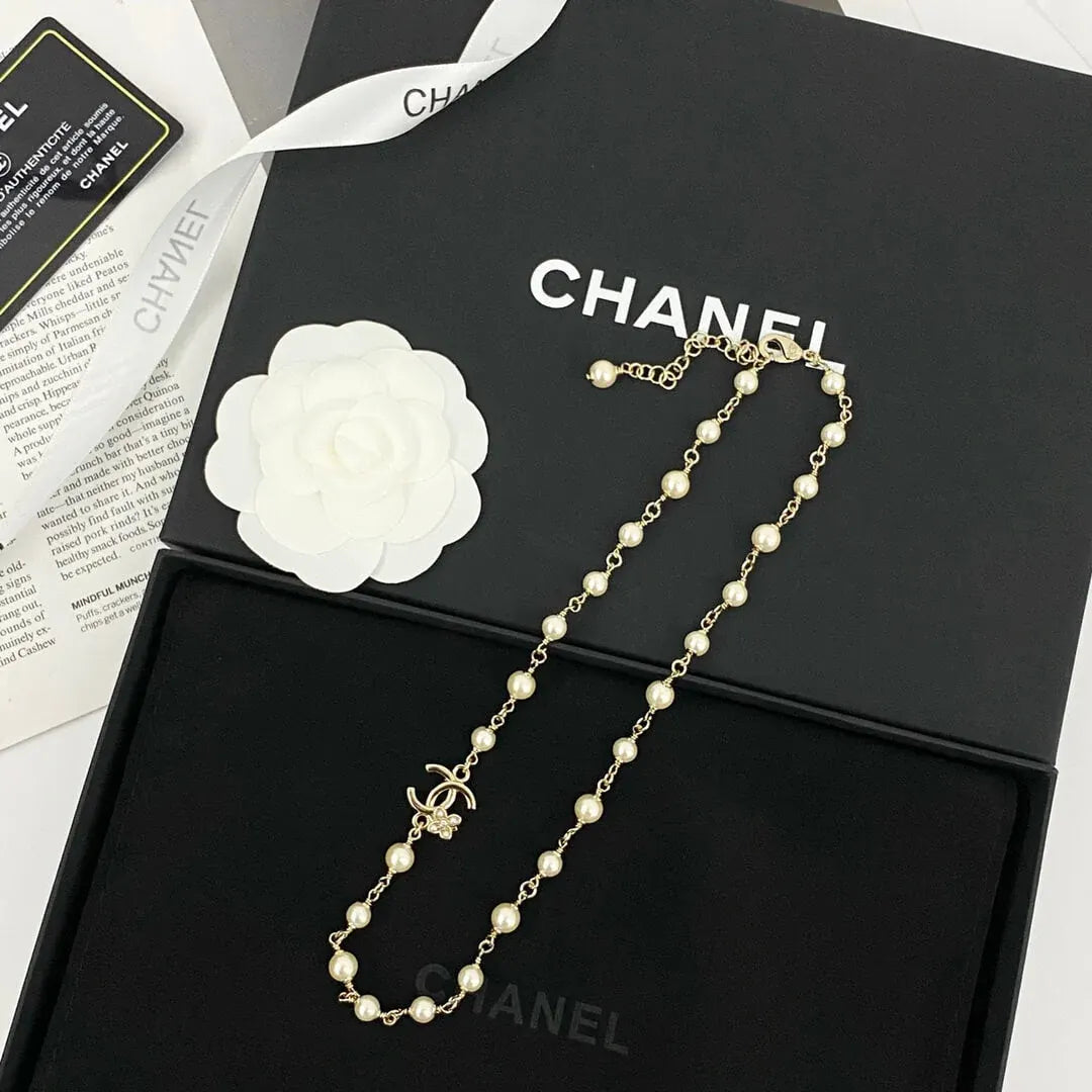 Classic Pearl Necklace with Metal Accents