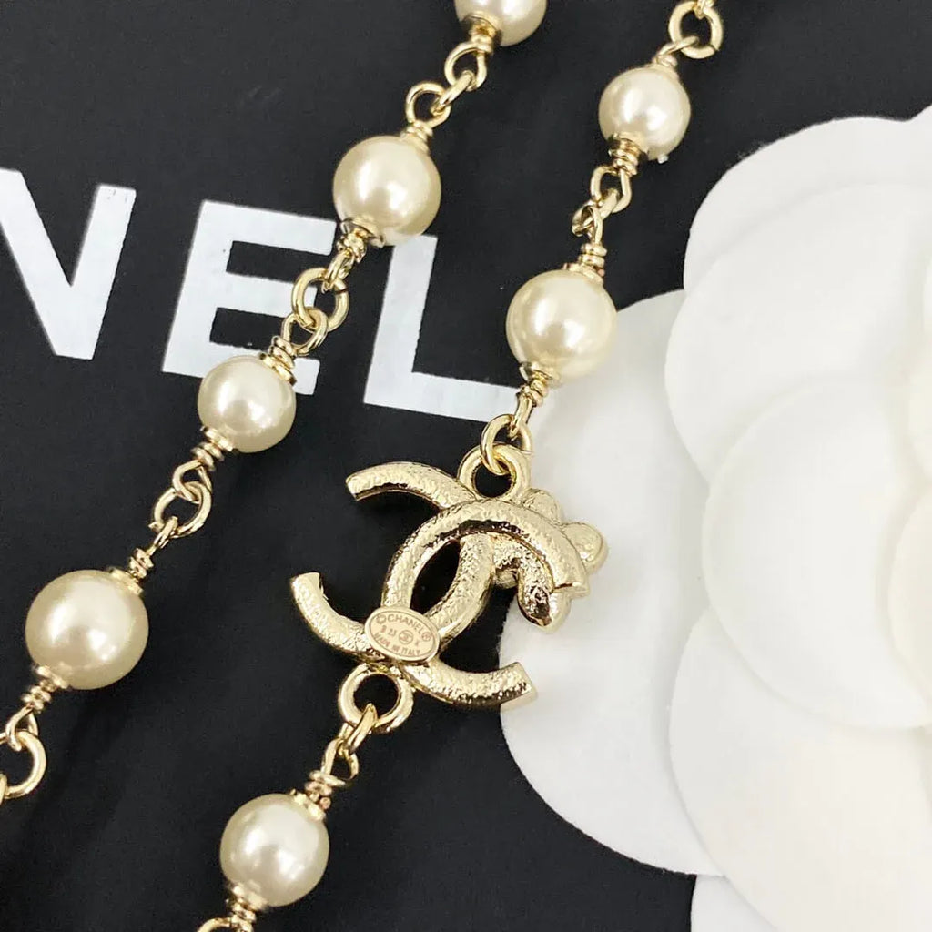 Classic Pearl Necklace with Metal Accents